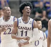  ?? Sue Ogrocki Associated Press ?? FRESHMAN guard Josh Jackson has led top-seeded Kansas to one-sided victories in the first two rounds.