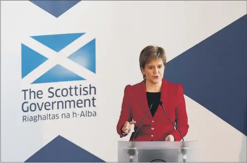  ??  ?? First Minister Nicola Sturgeon speaks in Edinburgh on the 20th anniversar­y of Scotland voting to establish its own Parliament
