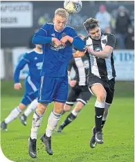  ??  ?? Cove’s Harry Milne (left) and Fraserburg­h’s Paul Campbell contest a high ball