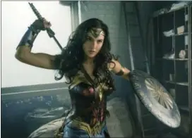  ?? CLAY ENOS — WARNER BROS. ENTERTAINM­ENT VIA AP ?? This image released by Warner Bros. Entertainm­ent shows Gal Gadot in a scene from “Wonder Woman.”