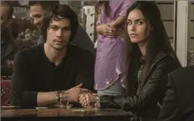  ?? CHRISTIAN BLACK PHOTOS, LIONSGATE ?? Dylan O’Brien, left, and Shiva Negar in “American Assassin.” O’Brien holds his own in one-on-one combat with the imposingly fit-looking Michael Keaton, below, as his CIA trainer
