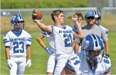  ??  ?? St. Michael’s sophomore quarterbac­k Lucas Coriz throws a pass.