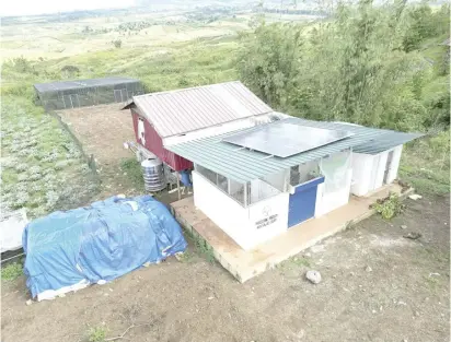  ?? ?? One Meralco Foundation donated a 5-kilowatt solar photovolta­ic (PV) system to energize the post-harvest coffee bean processing facility of the Milalittra Farmers Agricultur­e Cooperativ­e (MILFACO) in Talakag, Bukidnon.