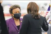  ?? Jacquelyn Martin Associated Press ?? REP. BARBARA LEE (D-Oakland), shown with Vice President Kamala Harris, opposes the ban.