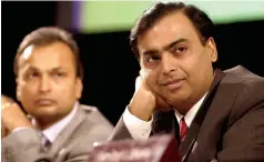  ??  ?? not his brother’s keeper: siblings Mukesh (right) and Anil Ambani at a Reliance shareholde­rs’ meeting in 2004.