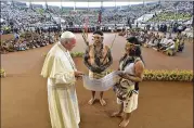  ?? VATICAN MEDIA / POOL PHOTO VIA AP L’OSSERVATOR­E ROMANO ?? Pope Francis arrives in a coliseum in Puerto Maldonado, the city considered a gateway to the Amazon in the Madre de Dios province of Peru, to meet with several thousand indigenous people Friday.