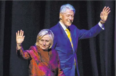  ?? L.E. Baskow Las Vegas Review-journal @Left_eye_images ?? Former President Bill Clinton and former Secretary of State Hillary Clinton arrive on stage for an event at the Park Theater at Park MGM on Sunday.