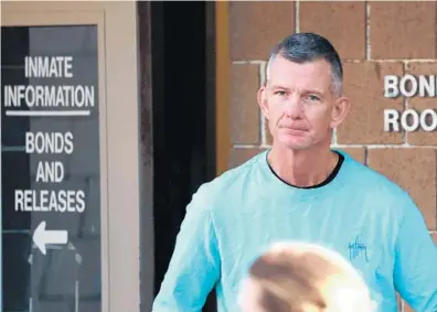  ?? JOE BURBANK/ORLANDO SENTINEL PHOTOS ?? Winter Park Police Chief Michael Deal leaves the Seminole County Jail in Sanford after bonding out Thursday. Deal was arrested Wednesday on a domestic violence charge reportedly after a family argument.