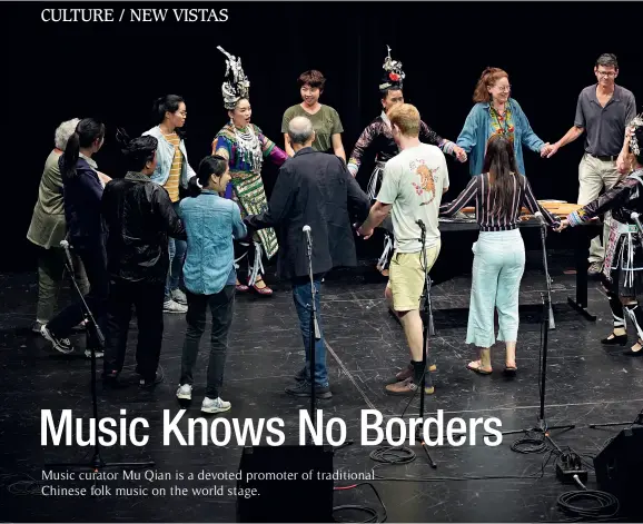  ?? Peter Smith ?? The Yandong Grand Singers performs at the University of Michigan together with some of the audience in September 2019.