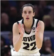  ?? STEPH CHAMBERS — GETTY IMAGES ?? Caitlin Clark scored 21points and Iowa rallied past UConn to reach the women's championsh­ip game at Cleveland.