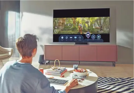  ?? SAMSUNG ELECTRONIC­S ?? New Samsung TVs will have a Super Ultrawide Gameview feature that lets you play in other aspect ratios. The company joins hundreds of others that will showcase their new devices at the virtual 2021 CES show.