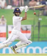  ?? AFP ?? Sri Lanka’s Roshen Silva plays a cover drive during his knock of 85 against England in Kandy yesterday.