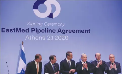  ?? (Alkis Konstantin­idis/Reuters) ?? ISRAELI, GREEK, and Cypriot leaders sign the EastMed gas pipeline deal in 2020. Erdogan’s gestures toward Israel intensifie­d after US President Joe Biden dropped his support for the pipeline.