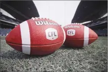  ?? Canadian Press photo ?? New CFL balls are photograph­ed at the Winnipeg Blue Bombers stadium in Winnipeg in this 2018 file photo.