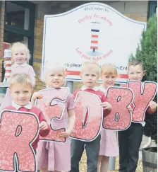  ??  ?? Children at Redby Academy celebrate success.