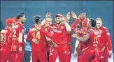  ?? PTI ?? Punjab Kings players celebrate the wicket of Rohit Sharma of Mumbai Indians in Pune on Wednesday.