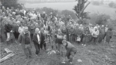  ?? ?? Ramblers remembered a lost loved one with a landscapin­g memorial in Taplow in 1992.