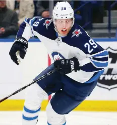  ?? JEFFREY T. BARNES/THE ASSOCIATED PRESS ?? Patrik Laine’s Winnipeg Jets are sputtering with just two wins in the last seven games, Paul Friesen writes, and it’s obvious the team is not as cohesive as last season.