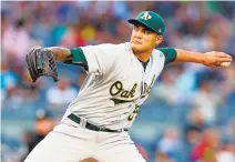  ?? MIKE STOBE/GETTY IMAGES ?? Starter Sean Manaea of the A’s handcuffed the Yankees on Friday, allowing just four hits in seven scoreless innings and walking one.