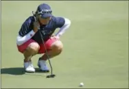  ?? JIM MATTHEWS — THE ASSOCIATED PRESS ?? Katherine Kirk lines up a putt during the second round of the Thornberry Creek LPGA Classic on Friday.