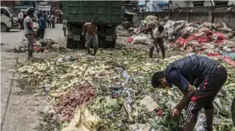  ?? Chris Steele-Perkins/Magnum Photos for FAO ?? A scene of food waste on the street near the Kalimati Vegetable Market in Kathmandu, Nepal, 31 July 2017.