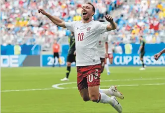  ?? MARTIN MEISSNER
THE ASSOCIATED PRESS ?? Denmark’s Christian Eriksen celebrates his goal against Australia at the World Cup in Samara, Russia, on Thursday. The match eneded in a 1-1 draw.
