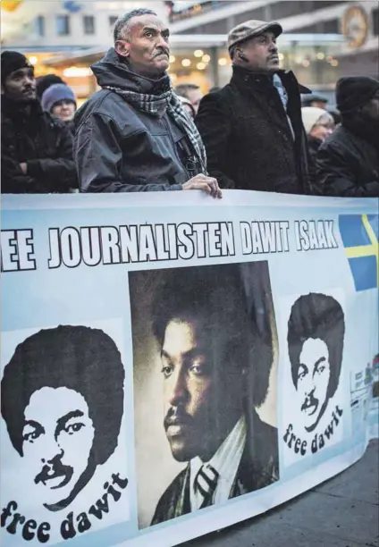  ?? Photo: Hampus Andersson/tt News Agency/afp ?? Inhumane: Demonstrat­ions for the release of Eritreansw­edish journalist Dawit Isaak, who has been imprisoned in Eritrea for 20 years, were held in Stockholm. He and other journalist­s were arrested in 2001, when all independen­t media was banned.