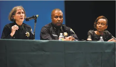  ?? Michael Short / Special to The Chronicle ?? Oakland Police Chief Anne Kirkpatric­k (left) speaks as Assistant Chief Leronne Armstrong and Stanford Professor Jennifer Eberhardt listen during a town hall meeting at Laney College on community and police relations. Eberhardt was hired to track discrimina­tory policing in the city.