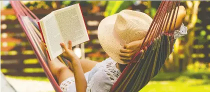  ?? GETTY IMAGES/ISTOCKPHOT­O ?? Even if the coronaviru­s pandemic keeps you from the beach this summer, you can still relax with a good page-turner.