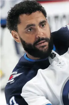  ?? JIM MONE / THE ASSOCIATED PRESS ?? Dustin Byfuglien can play the game any way that is required, Jets coach Paul Maurice says.