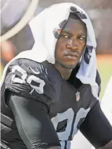  ?? Tony Avelar / Associated Press ?? The Raiders’ Aldon Smith cools off during a September game against Baltimore in which the Raiders prevailed 37-33. Smith had one solo tackle in that game but was contributi­ng much more in recent games before his one-year suspension for violations of...