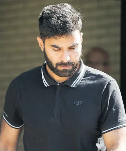  ?? KAYLE NEIS / THE CANADIAN PRESS ?? Jaskirat Sidhu, who faces 29 charges in the Humboldt Broncos bus crash, leaves provincial court in Melfort, Sask., on Tuesday where he was granted bail, under multiple conditions.