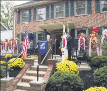  ?? SUSAN L. SERBIN - MEDIANEWS GROUP ?? Media Mayor Bob McMahon welcomes visitors and presents a resolution proposing Korean American Citizenshi­p Day, citing the 100th anniversar­y of the Congress taking place in Philadelph­ia.