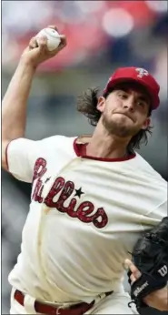  ?? DERIK HAMILTON — THE ASSOCIATED PRESS ?? Philadelph­ia Phillies starting pitcher Aaron Nola throws during the third inning of the team’s baseball game against the Baltimore Orioles.