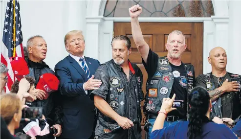  ?? — AP PHOTO ?? President Donald Trump, shown here Saturday with Bikers for Trump, and Republican­s are aiming for a strong turnout in fall mid-term elections among the conservati­ve white voters who helped sweep him into office.