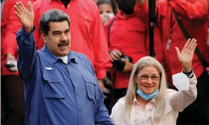  ?? Photograph: Leonardo Fernández Viloria/Reuters ?? President Nicolas Maduro and his wife, Cilia Flores, at a Venezuela government rally in February. The country and the US have exchange prisoners including five oil executives after secretive talks.