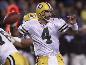 ??  ?? In this Nov. 27, 2000, file photo, Green Bay Packers quarterbac­k Brett Favre looks to pass in the second quarter against the Carolina Panthers in Charlotte, N.C. AP PHOTO