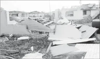  ??  ?? Devastatio­n on Barbuda from Hurricane Irma (CARICOM photo)