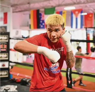  ?? Billy Calzada / Staff photograph­er ?? San Antonio flyweight Jesse “Bam” Rodriguez — the youngest world champion in boxing at age 22 — will help christen the city’s new Tech Port Arena for the sport on June 25.