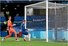  ??  ?? Chelsea’s Timo Werner nods home the opener from close range in their Champions League semifinal with Real Madrid.