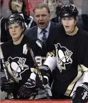  ?? ASSOCIATED PRESS FILE PHOTO ?? Penguins’ Sidney Crosby, pictured left during a game against the New Jersey Devils in Pittsburgh in October 2006, racked up 120 points in 79 games during his second NHL season (’06-07), the sixth-highest total for a sophomore in history.