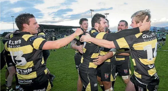  ?? PHOTO: RICKY WILSON/STUFF ?? Waitohi celebrates a hard-fought win after the final whistle after edging out Renwick 20-19 in the club rugby final.