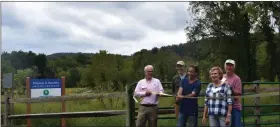  ?? PHOTO COURTESY OF FRENCH & PICKERING CREEKS CONSERVATI­ON TRUST ?? To celebrate this momentous day in the Trust’s history, President Penny Hunt and Executive Director Bill Gladden welcomed guests to join programs including guided nature hikes, tours of the historic Warwick Furnace, water quality education, and scavenger hunts.