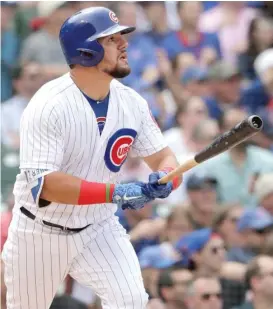  ?? CHARLES REX ARBOGAST/ AP ?? The Cubs’ Kyle Schwarber watches his home run off the Dodgers’ Ross Stripling in the fourth inning Wednesday at Wrigley Field.