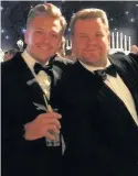  ??  ?? > Simon Wilson with James Corden at the Emmys after-party