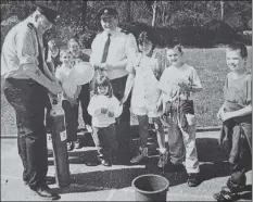  ?? ?? 1998: Carradale Primary School celebrated the opening of its garden. All the community joined in and pupils and visitors watched as Ronnie Souden and John Armour of Campbeltow­n Fire Station filled balloons for the balloon race.