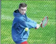  ?? AUSTIN HERTZOG - DIGITAL FIRST MEDIA ?? Owen J. Roberts’ Holden Smith hits a backhand during warmups against Methacton’s Subhanik Purkayasth­a.