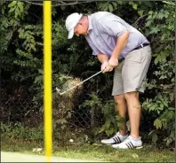  ?? Arkansas Democrat-Gazette/BENJAMIN KRAIN ?? Wes McNulty endures two whiffs while trying to chip his ball — nestled next to a chain-link fence — at the par-3 11th on Sunday at War Memorial Golf Course in Little Rock. McNulty, who took a quadruple-bogey 7, is five shots back going into Tuesday’s...