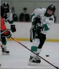  ?? ?? Novi’s Charlie Lewinski (15) shoots over the stick of Northville’s Matthew Heirtzler during the KLAA match-up played on Tuesday.