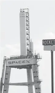  ?? Karen Warren / Houston Chronicle file ?? A rocket sits on top of its testing tripod at SpaceX, on Rocket Road in McGregor, in Central Texas.